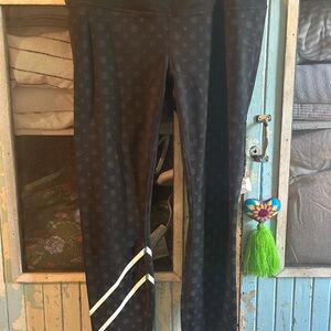 Athleta size medium leggings with reflective stripe